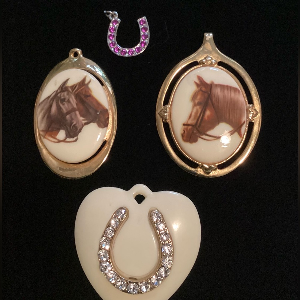 4 pretty shiny pendants with horse theme